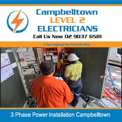 Level 2 electricians in safety gear working in 3 phase power installation in Campbelltown