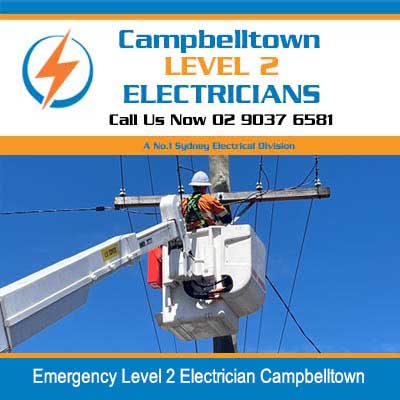 Emergency level 2 electrician in cherry picker bucket working on overhead power lines in Campbelltown